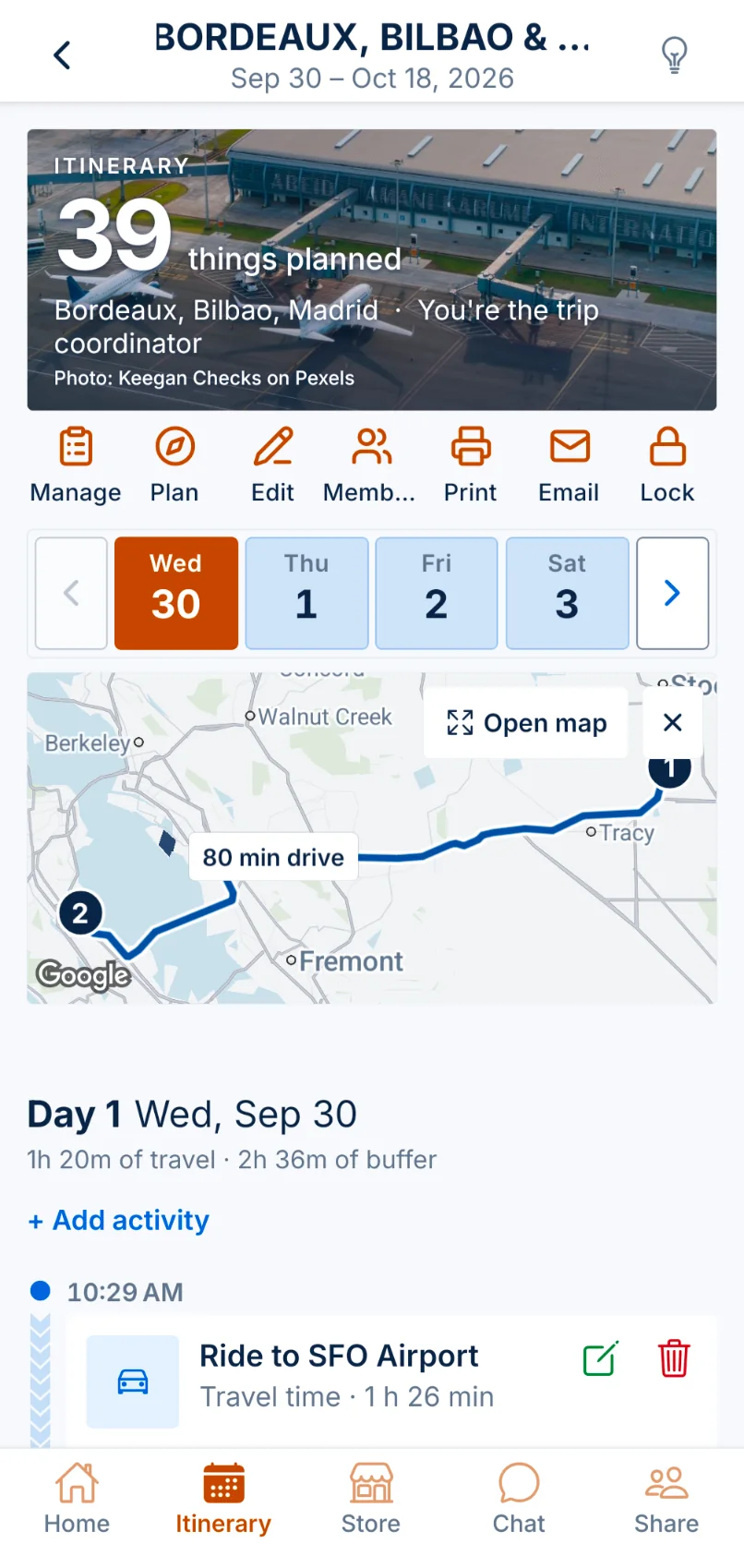 TourGuid itinerary with a day picker, a driving route map and the first activity of day one.